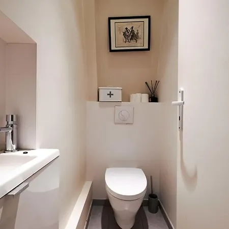 Апартаменты Au Coeur St Germain Париж
